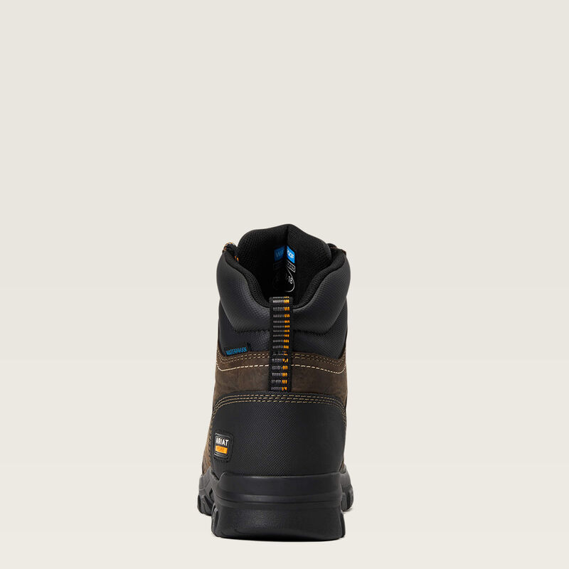 The back of a brown and black women's boot. 