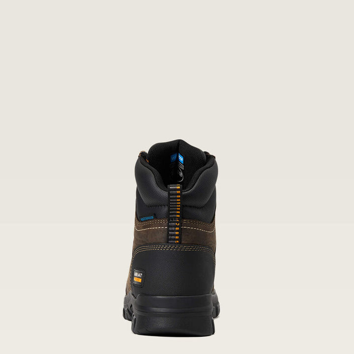 The back of a brown and black women's boot. 