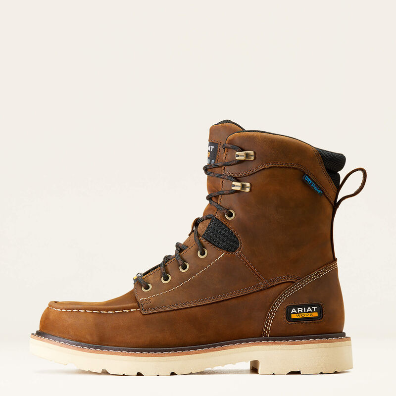 Brown leather boot with visible Ariat branding on a beige background