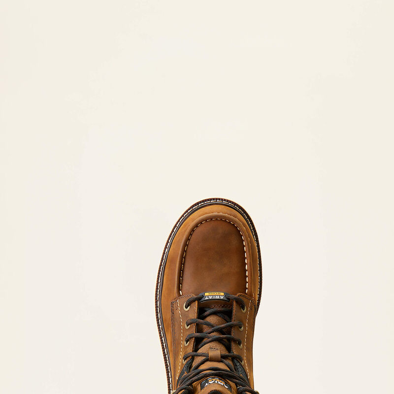 Brown leather boot on a beige background