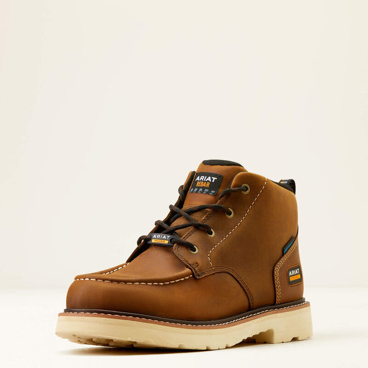 A brown leather Ariat Rebar Lift Chukka waterproof work boot with a lace-up closure, round toe, and low heel.