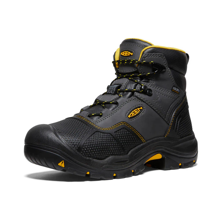 Gray and black boot with yellow accents on a white background
