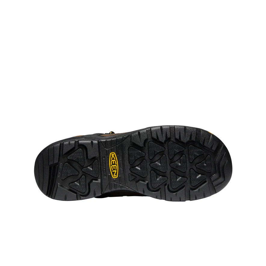 Black boot sole with a brand logo on a white background
