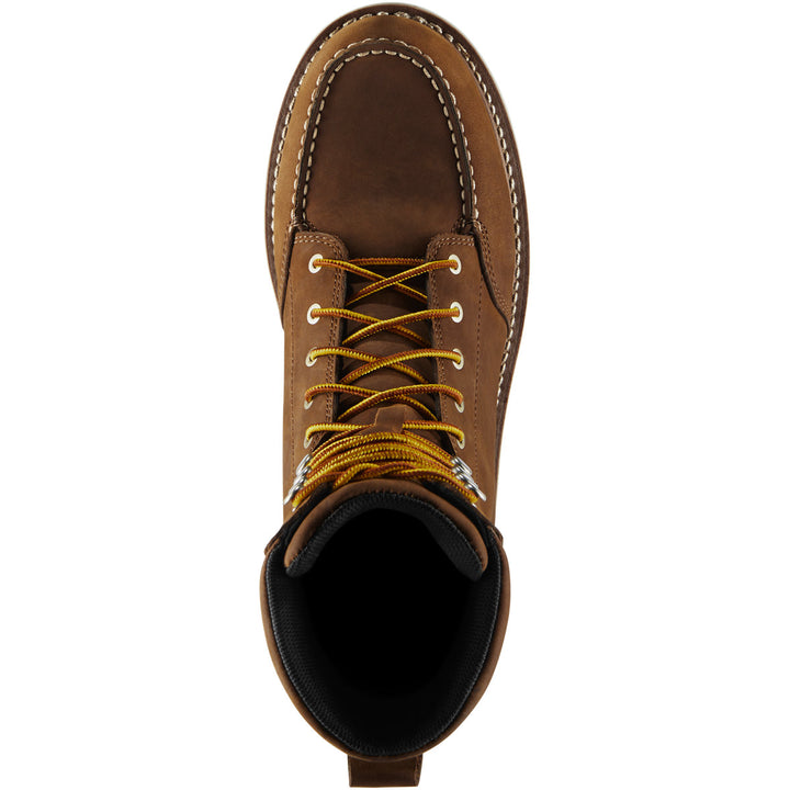 A top down view of a brown boot with yellow laces. 