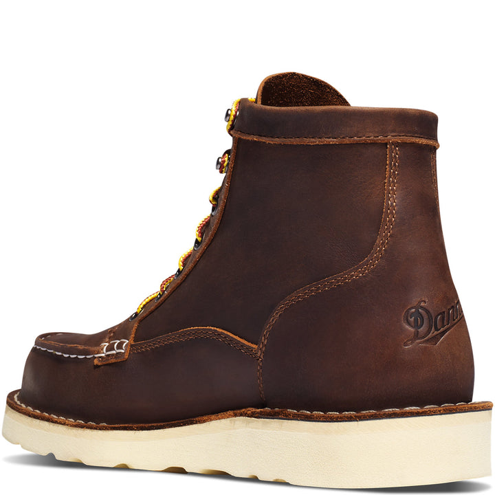  A brown boot with a white background. 