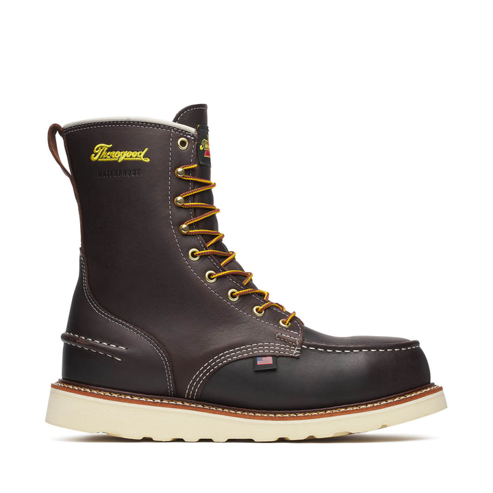 Brown leather boot with yellow laces on a white background