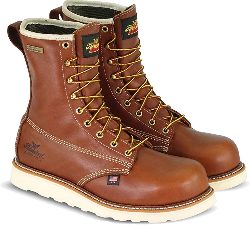 A pair of brown, lace-up, composite safety toe work boots with a waterproof membrane and a MAXWear Wedge outsole.