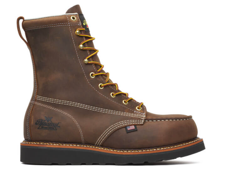 Brown leather boot with yellow laces on a white background