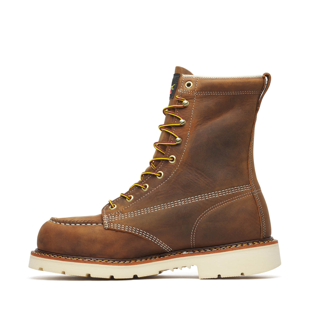 Brown leather boot with yellow laces on a white background