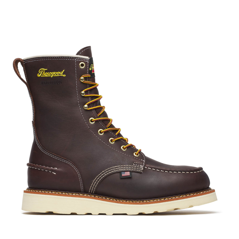 Brown leather boot with yellow laces on a white background