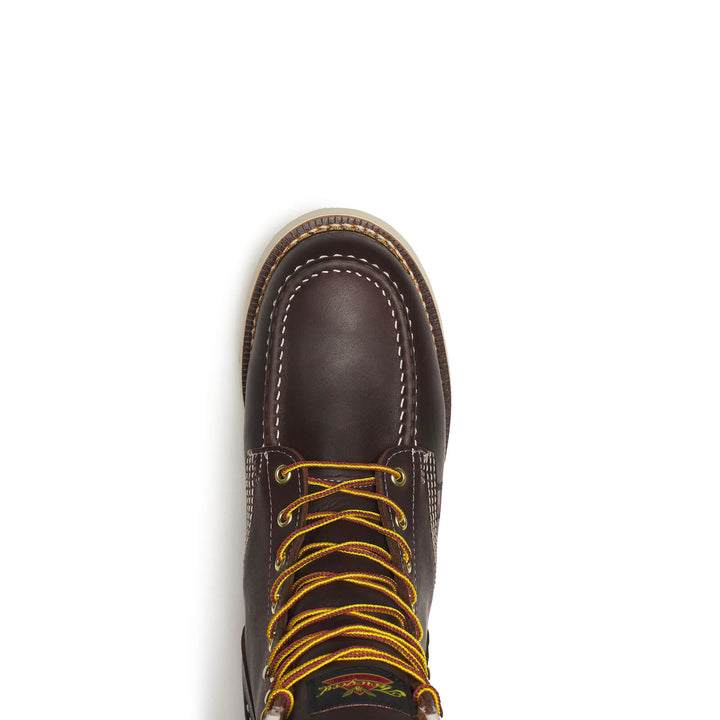 Brown leather boot with yellow laces on a white background