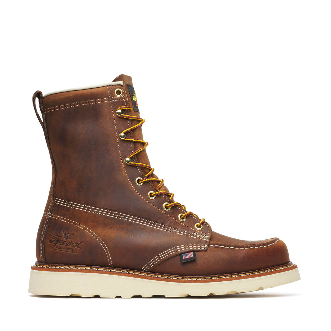 Brown leather boot with yellow laces on a white background