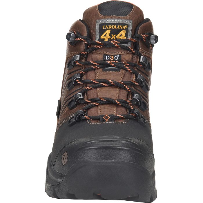A brown and black boot with a white background. 