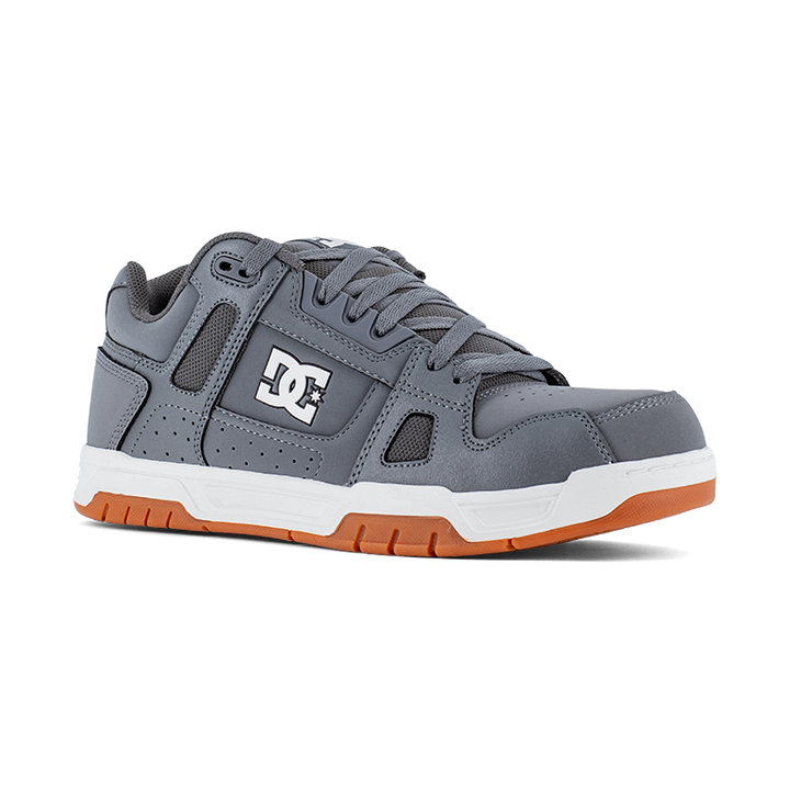 The side of a gray sneaker.