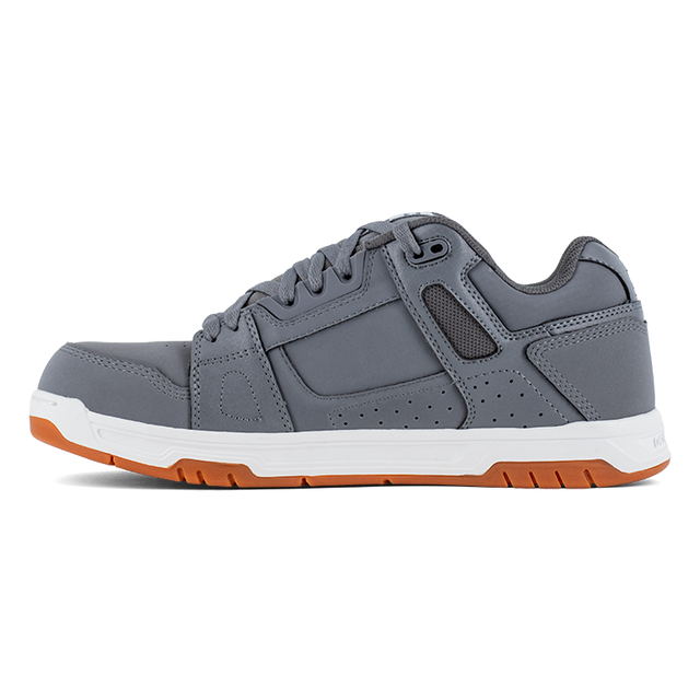 Gray sneaker with brown sole on a white background