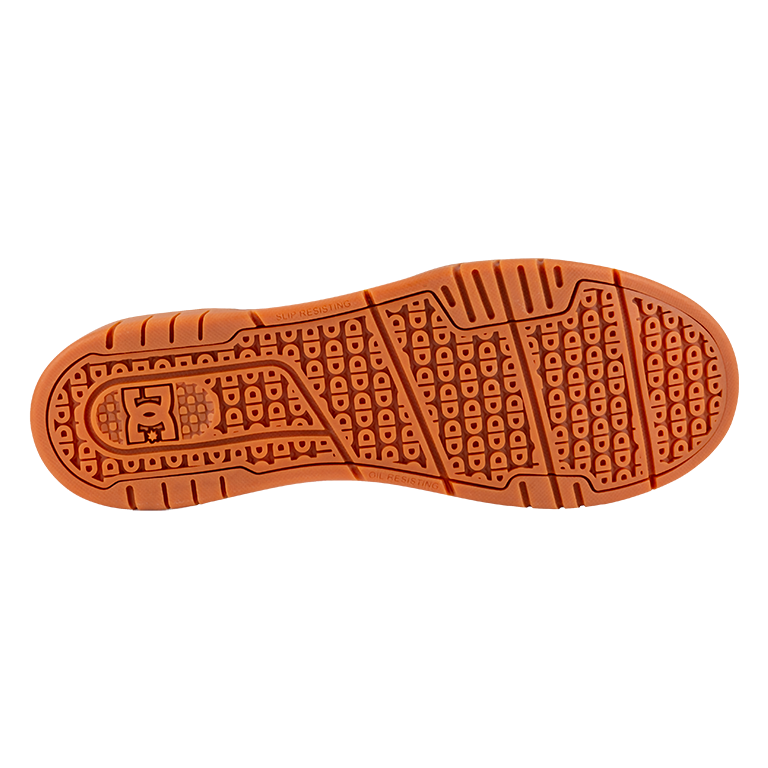 Close-up of an orange shoe sole on a white background