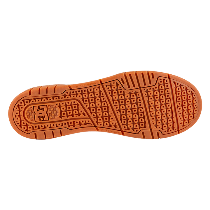 Close-up of an orange shoe sole on a white background