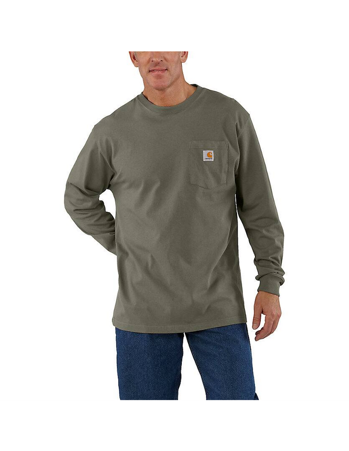 Man wearing a green long-sleeve shirt with a pocket on a white background
