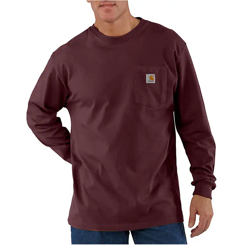 The front of a man wearing a maroon long sleeve shirt. 