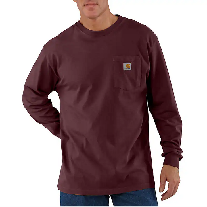 The front of a man wearing a maroon long sleeve shirt. 