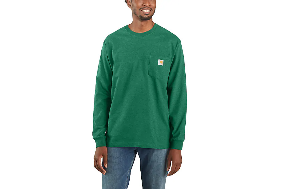 The front of a man wearing a teal long sleeve shirt. 
