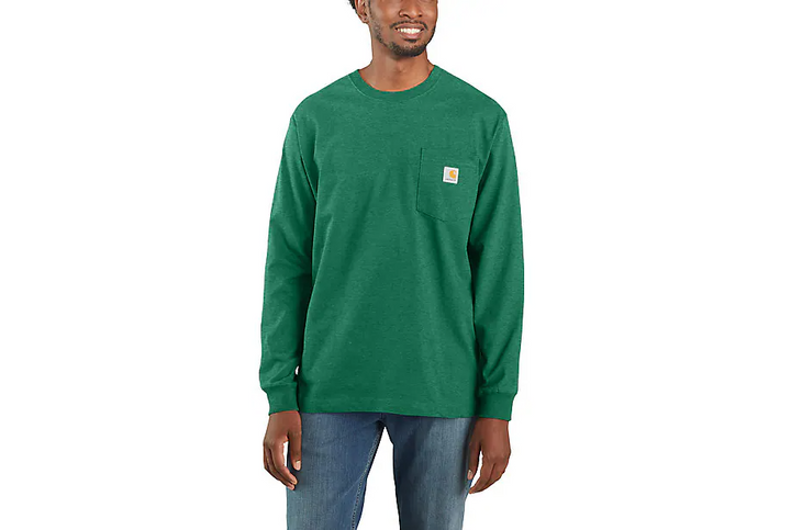 The front of a man wearing a teal long sleeve shirt. 