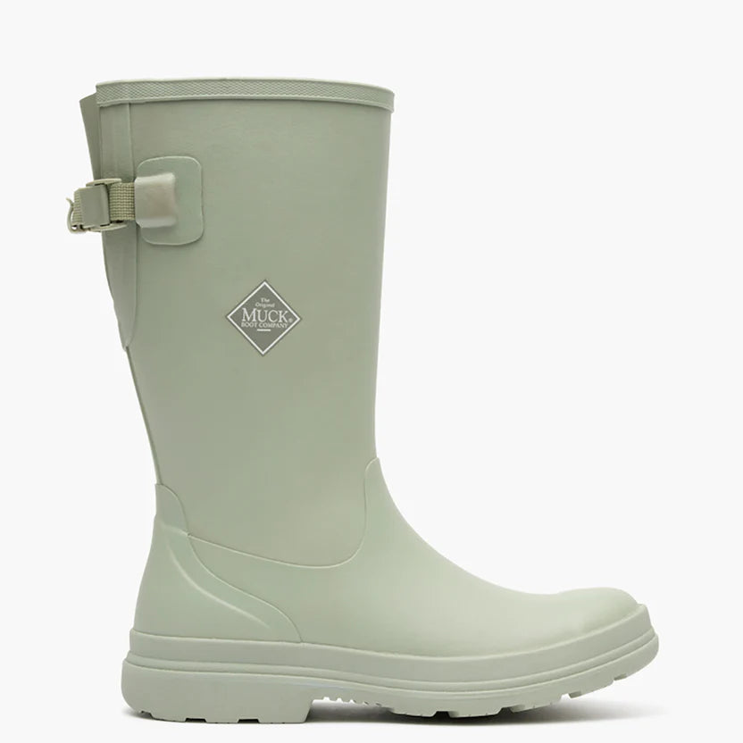 Light green rubber tall boot on a white background