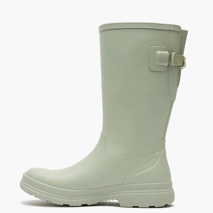 Light green rain boot on a white background