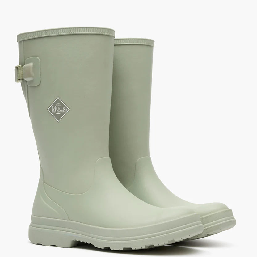Light green rubber tall boot on a white background