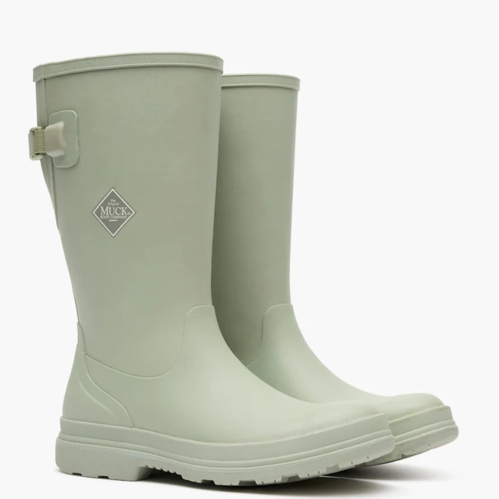 Light green rubber tall boot on a white background